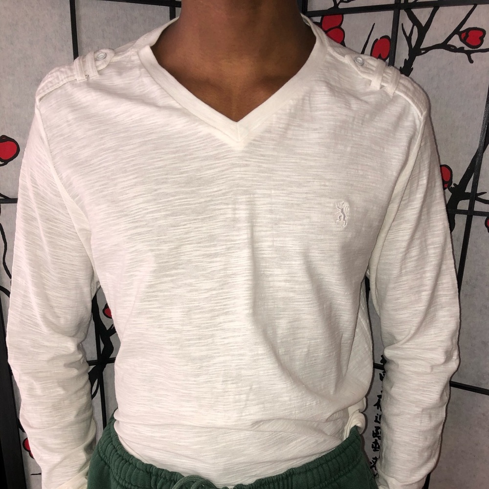 White long sleeve v-neck shirt